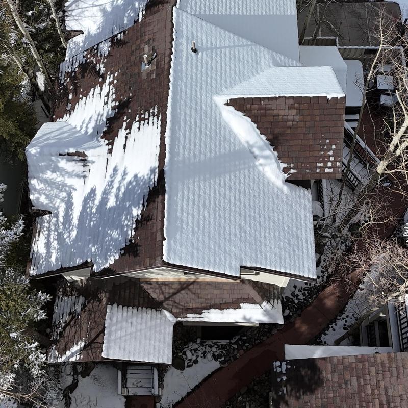 Asphalt shingle roof with snow cover in Breckenridge Asphalt shingle roof with snow cover in Breckenridge