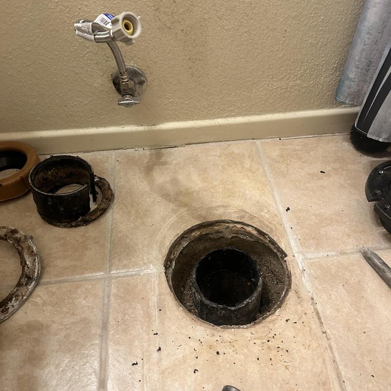 Toilet closet flange removed from tiled floor opening