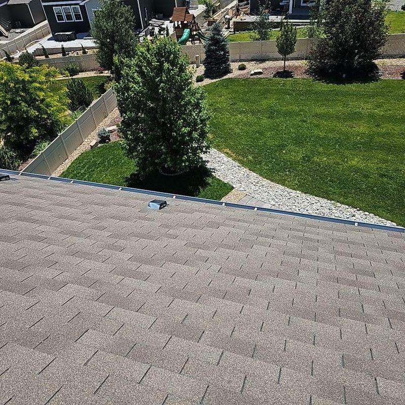 Asphalt shingle roof with minor wind damage inspection Asphalt shingle roof with minor wind damage inspection
