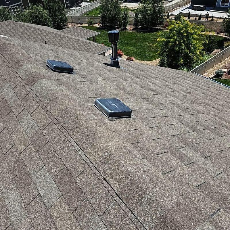 Asphalt shingle roof with minor wind damage inspection Asphalt shingle roof with minor wind damage inspection