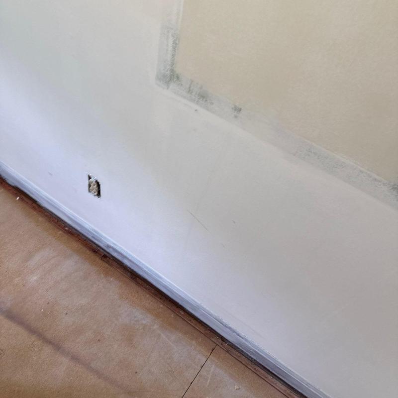 Drywall patch with sanding and primer preparation