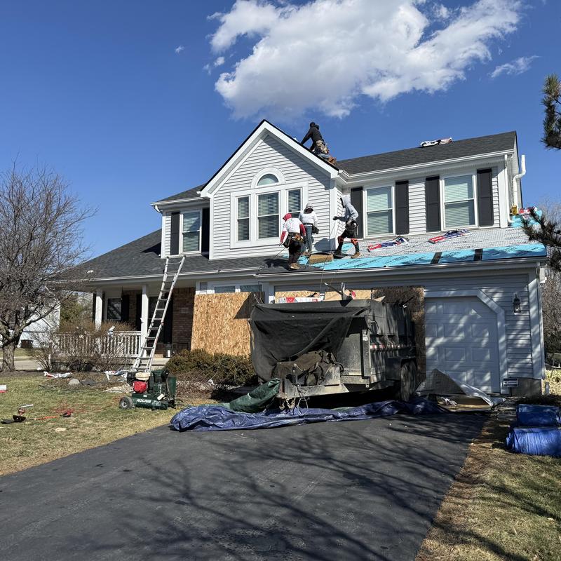 GAF HDZ asphalt shingle roof installation in progress GAF HDZ asphalt shingle roof installation in progress