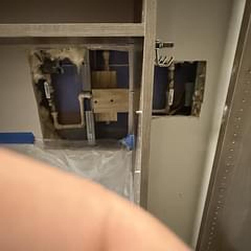 Shower valve and ball valves installed behind wall opening