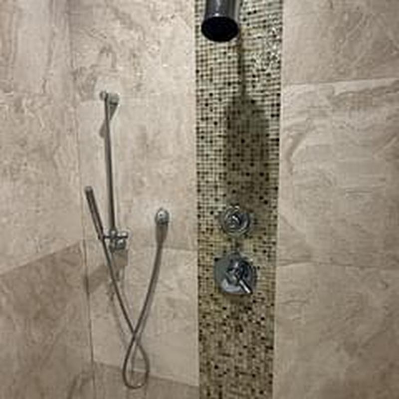 Shower valve with integral stops and ball valves