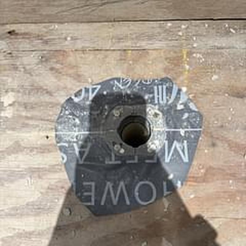 Shower drain and pan liner on wooden subfloor