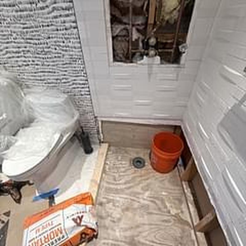 Shower pan and drain installation with pre-pitch floor