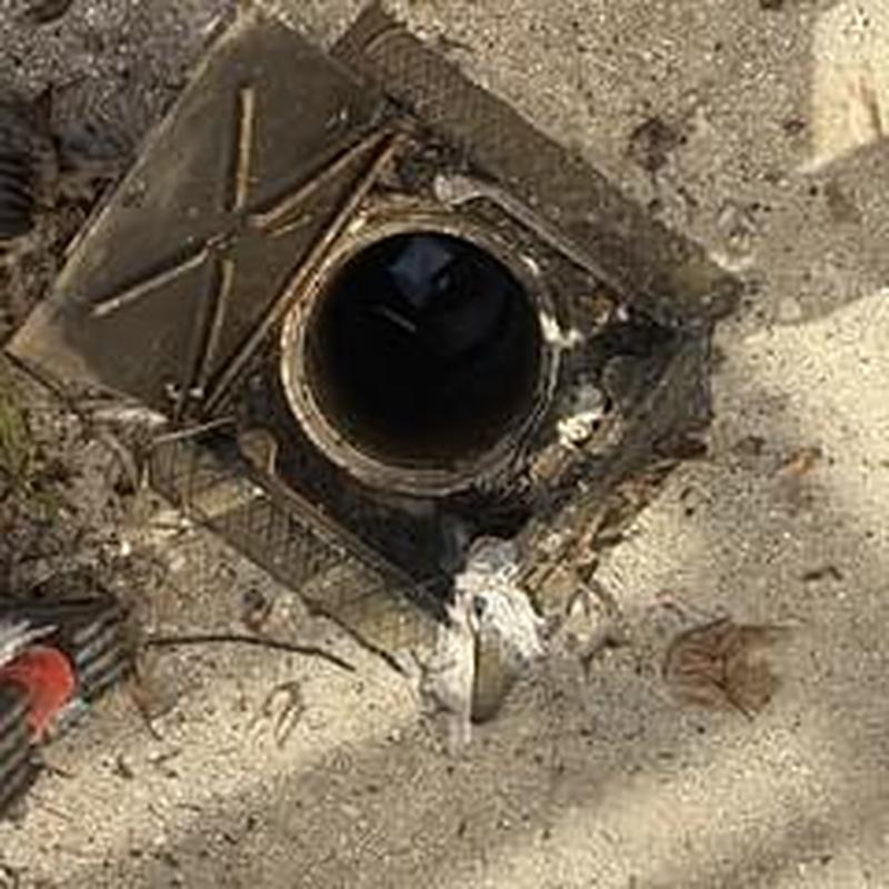 City sewer cleanout clearing with auger and cable