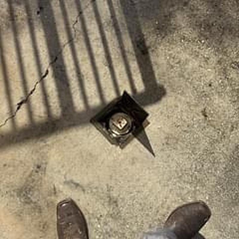 City sewer cleanout with auger cable and snake