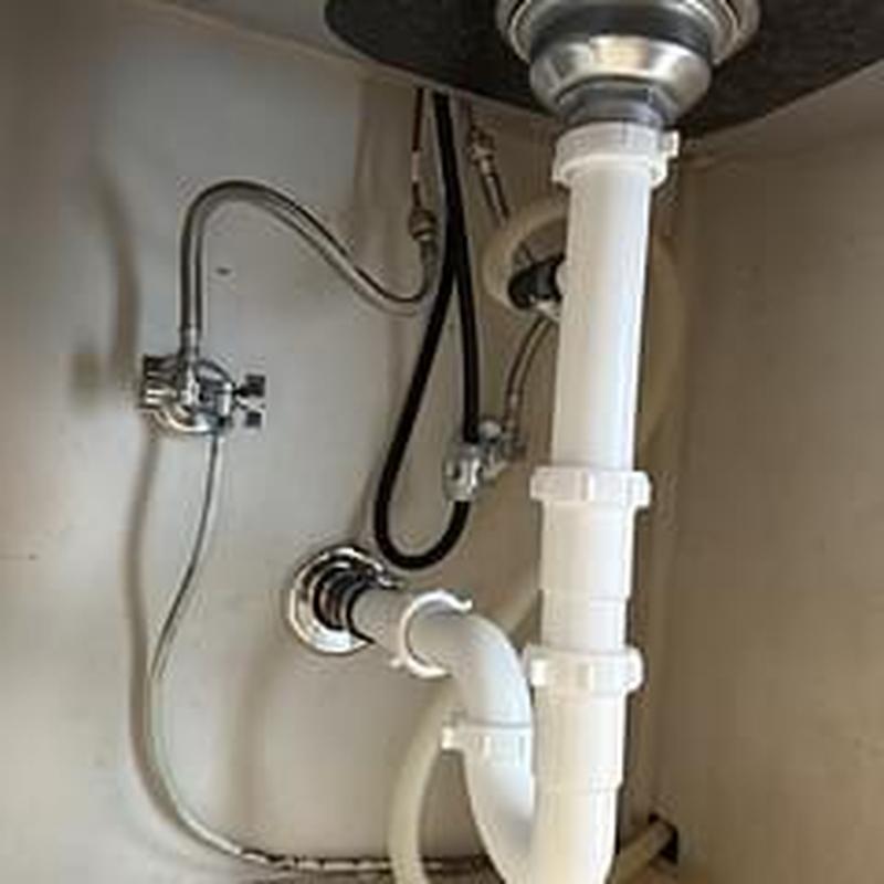 Kitchen sink drain line with P trap and shut off valves