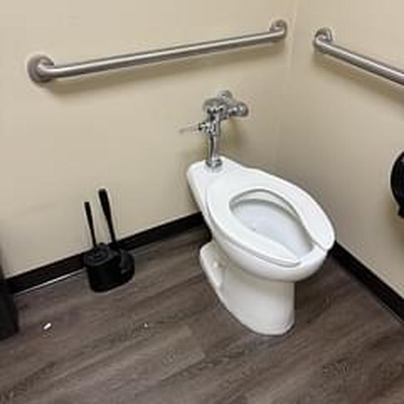 Flushometer toilet with replaced spud and diaphragm