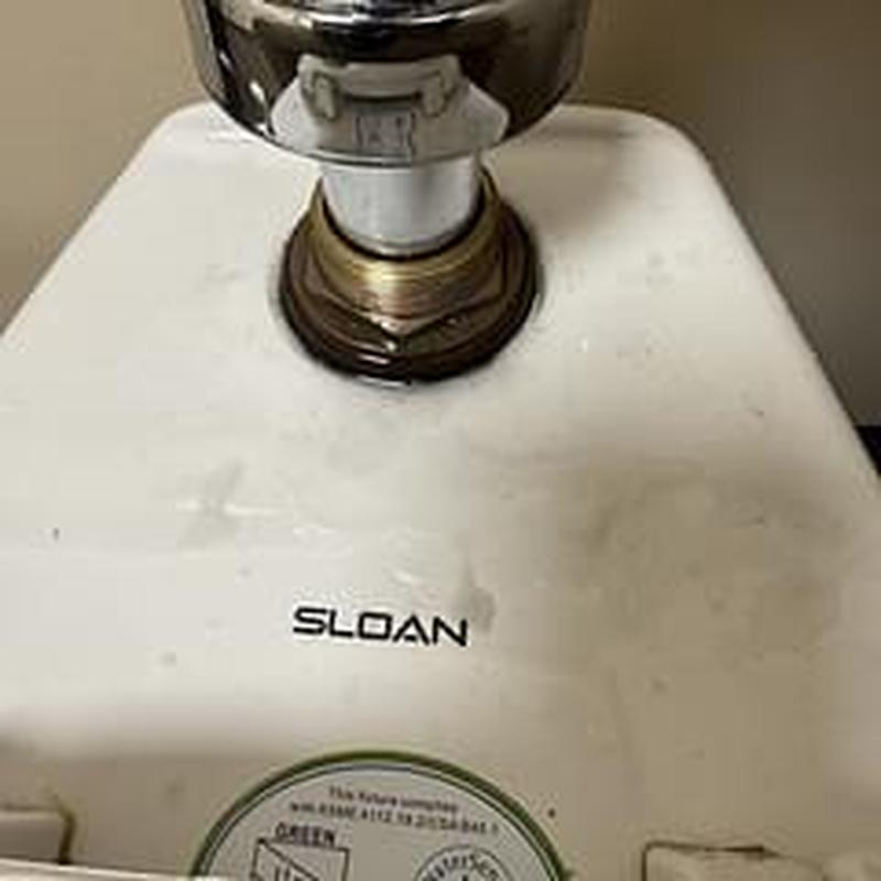 Flushometer toilet spud replacement and leak repair