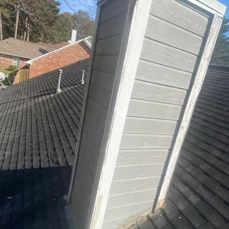 Chimney siding and flashing inspection on roof