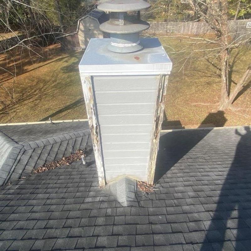 Chimney flashing and roof shingles inspection
