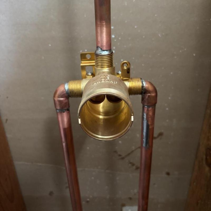 Shower valve installation with copper piping in wall