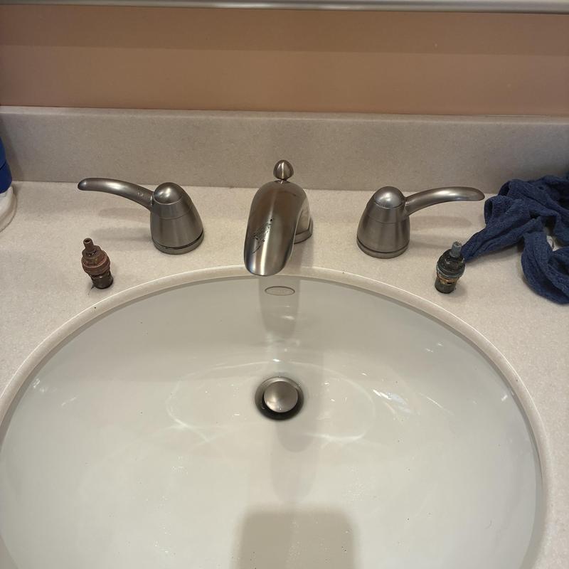 Widespread faucet stems replaced on bathroom sink