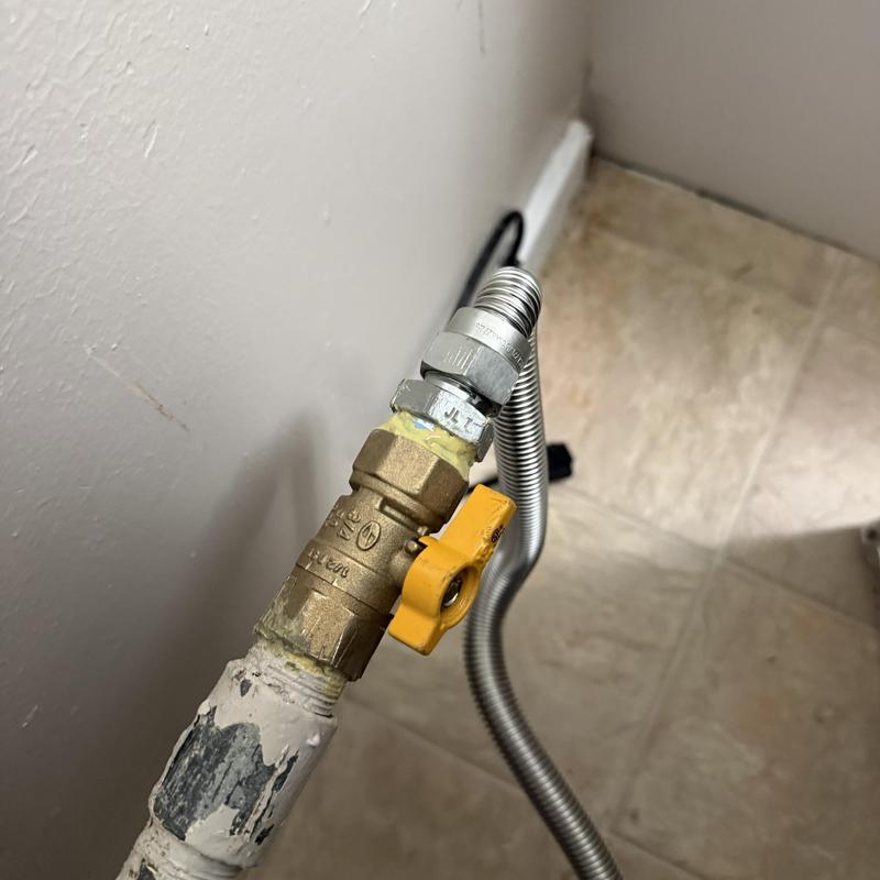 Gas valve with yellow handle and flexible connector