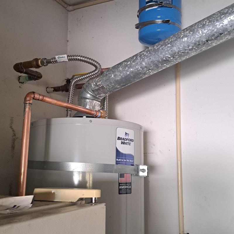 50-gallon water heater with vent and copper piping