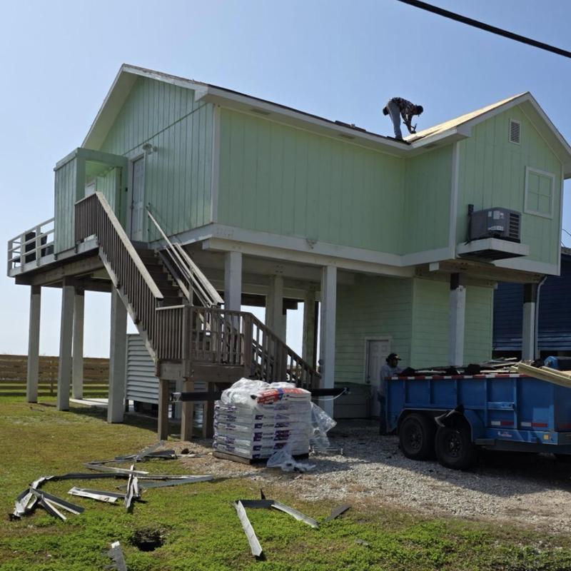 StormFighter Flex shingles installation on elevated house roof