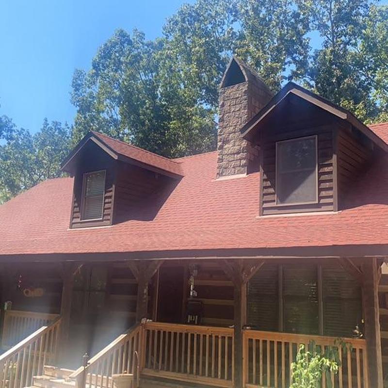 Shingles roof on log cabin with dormers and chimney Shingles roof on log cabin with dormers and chimney