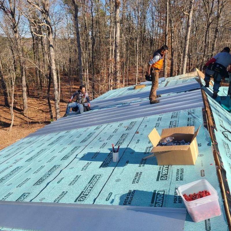 Metal stand seam roof installation with underlayment panels Metal stand seam roof installation with underlayment panels