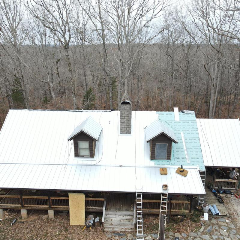 Metal stand seam roof installation with dormers Metal stand seam roof installation with dormers