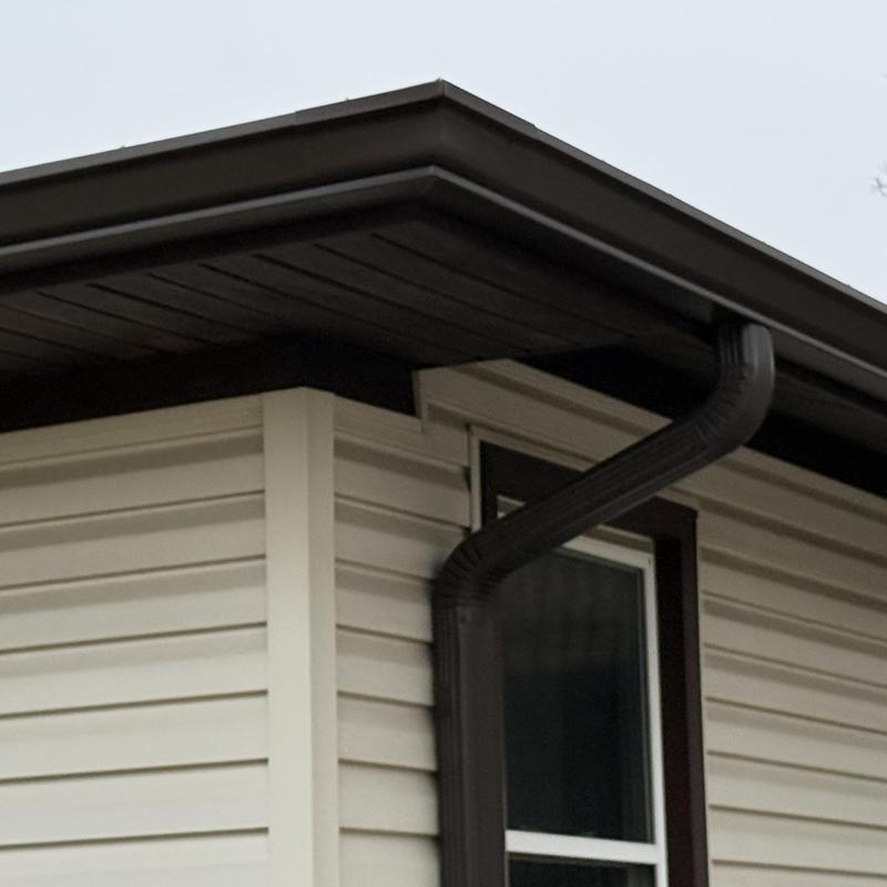 Gutter and downspout on house corner Elk Grove Village
