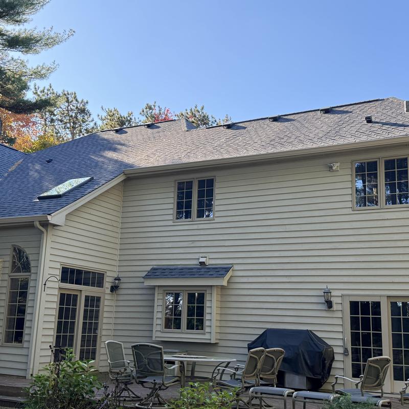 Atlas Pinnacle Pristine asphalt roof with skylight