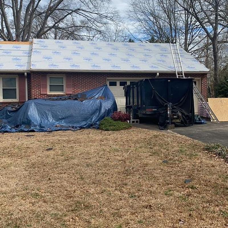 Shingle roof underlayment installation with debris removal Shingle roof underlayment installation with debris removal