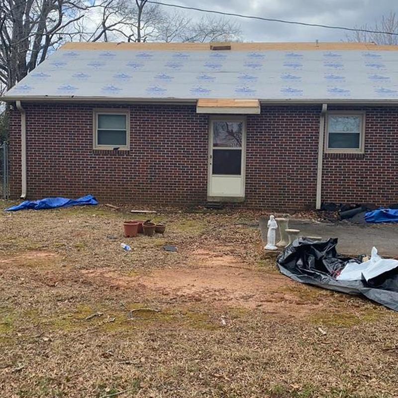 Roof decking installation with protective underlayment in progress Roof decking installation with protective underlayment in progress