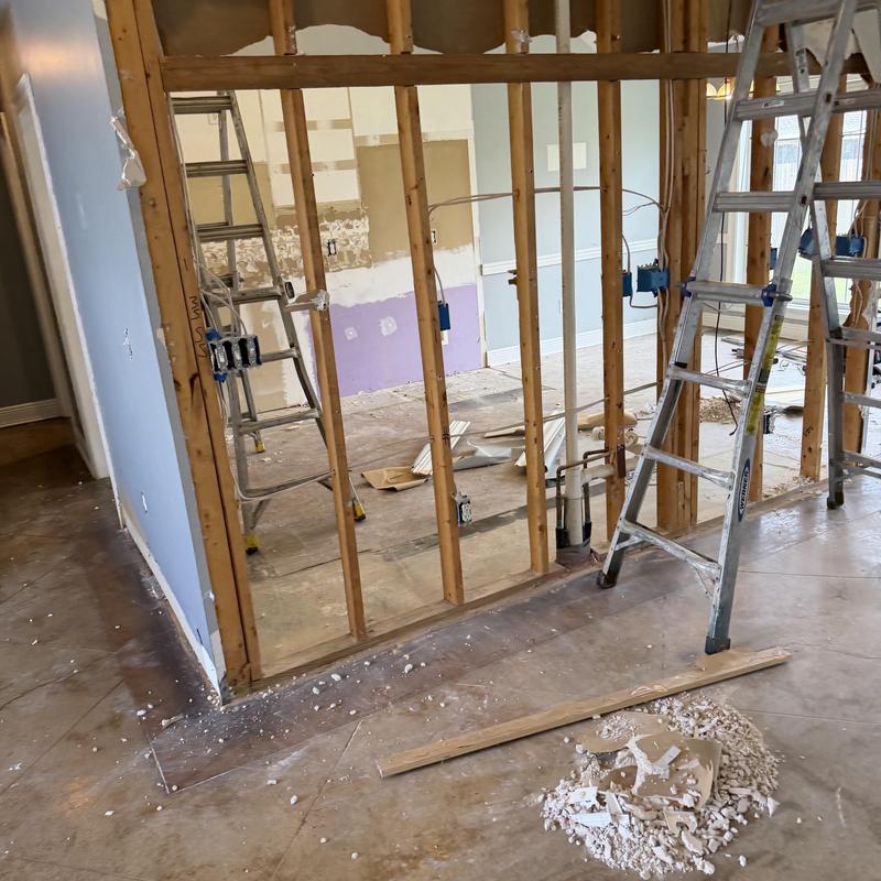 Kitchen wall framing and electrical box installation during remodel