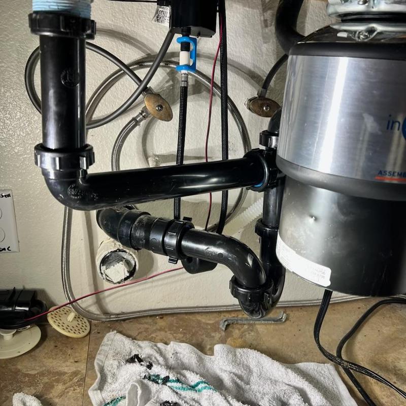 Kitchen drain pipes with clog and garbage disposal unit
