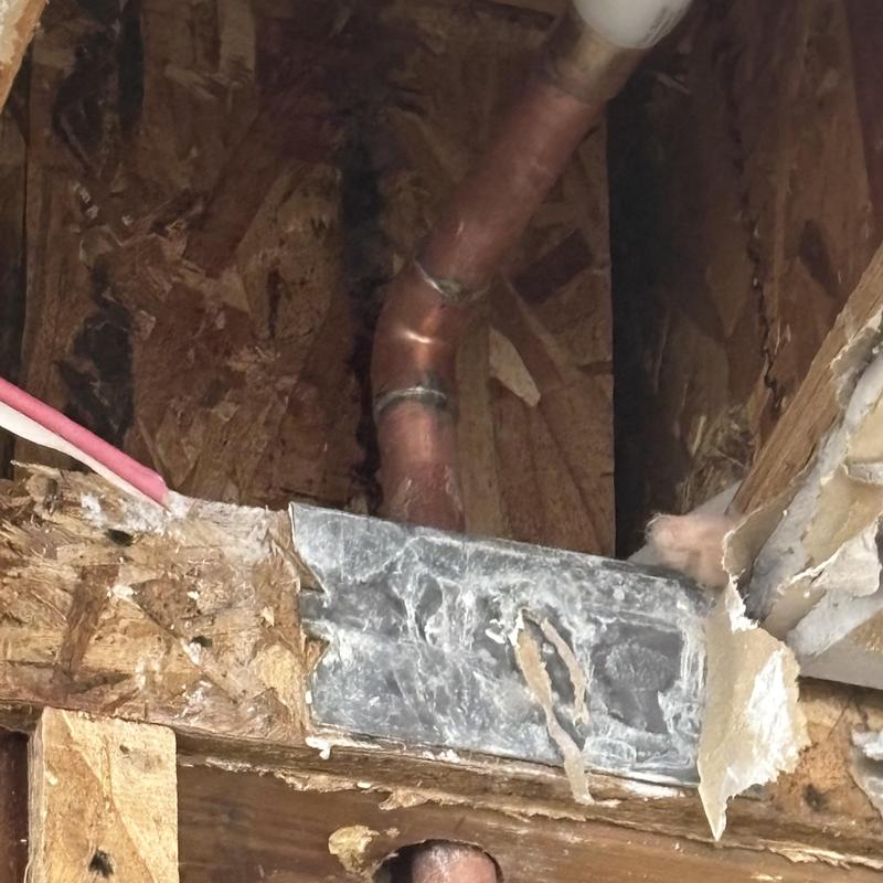 PEX pipe crack in ceiling behind water heater