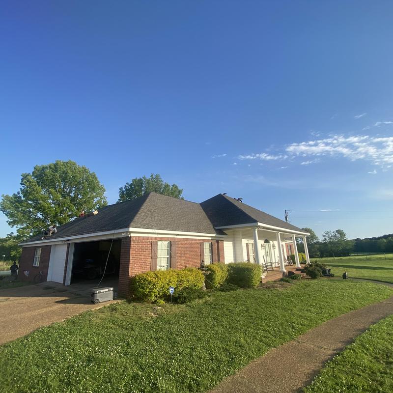 Duration shingle roof replacement on brick house