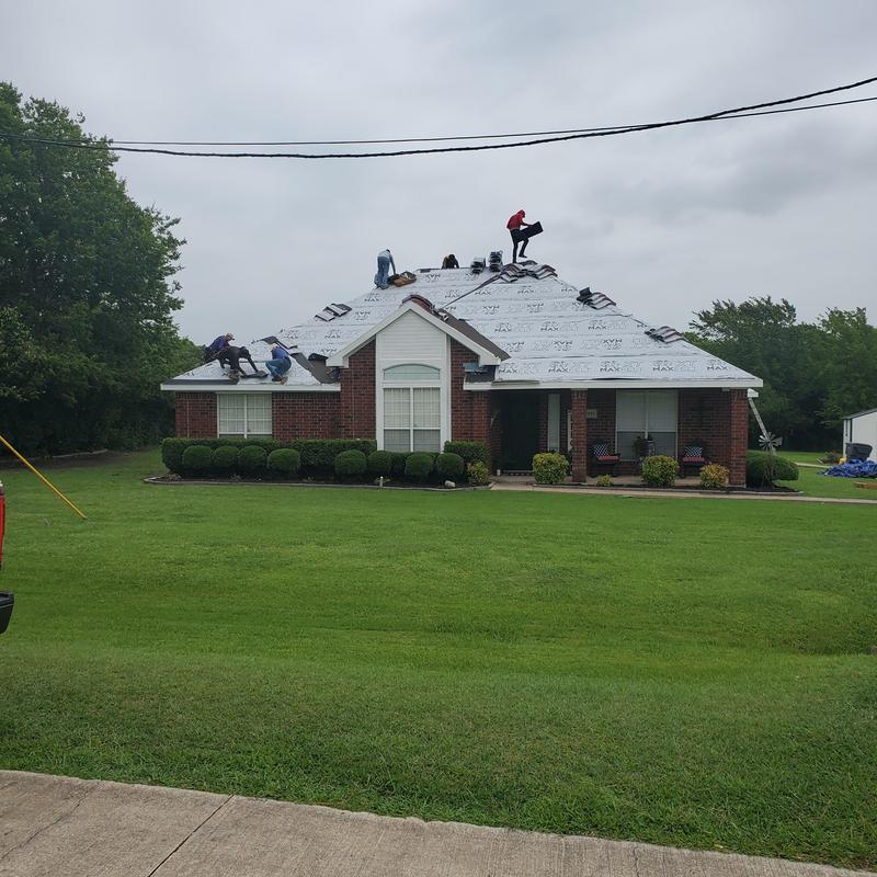 Residential roof underlayment installation after hail damage