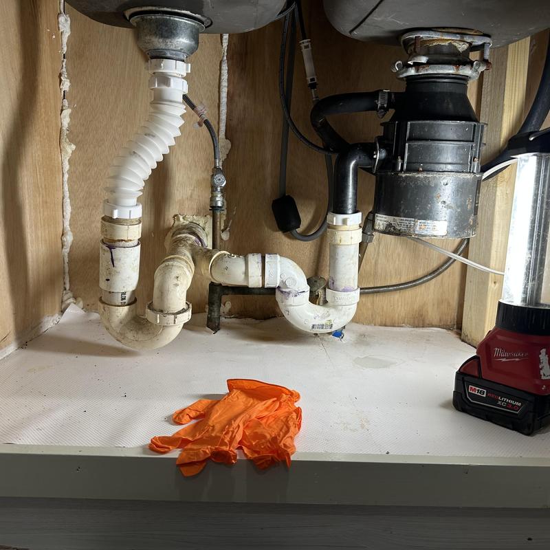 Kitchen sink disposal and drain pipes installation Kitchen sink disposal and drain pipes installation