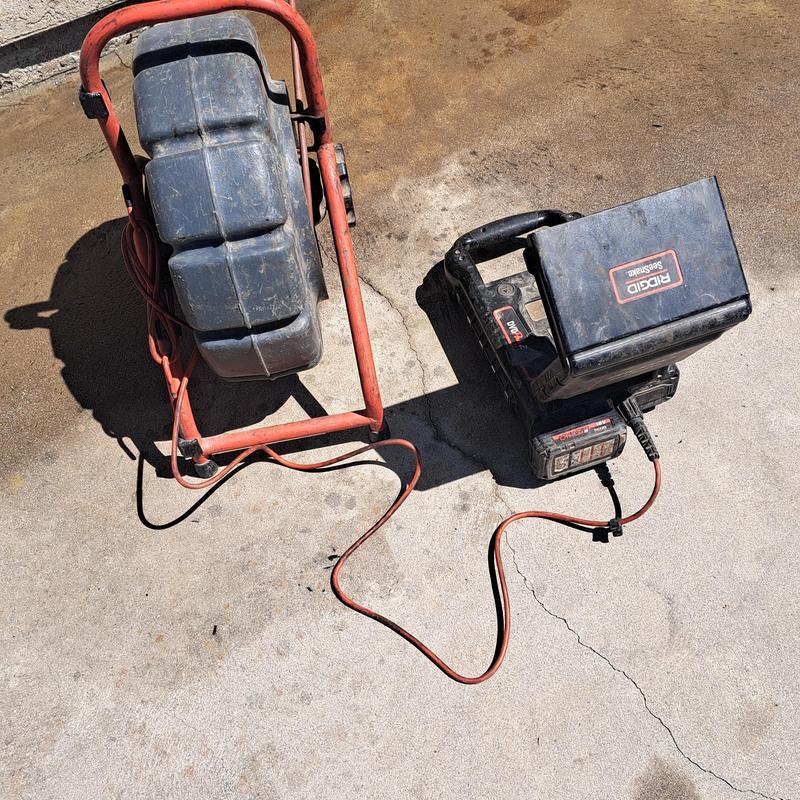 Sewer inspection camera and monitor on concrete ground