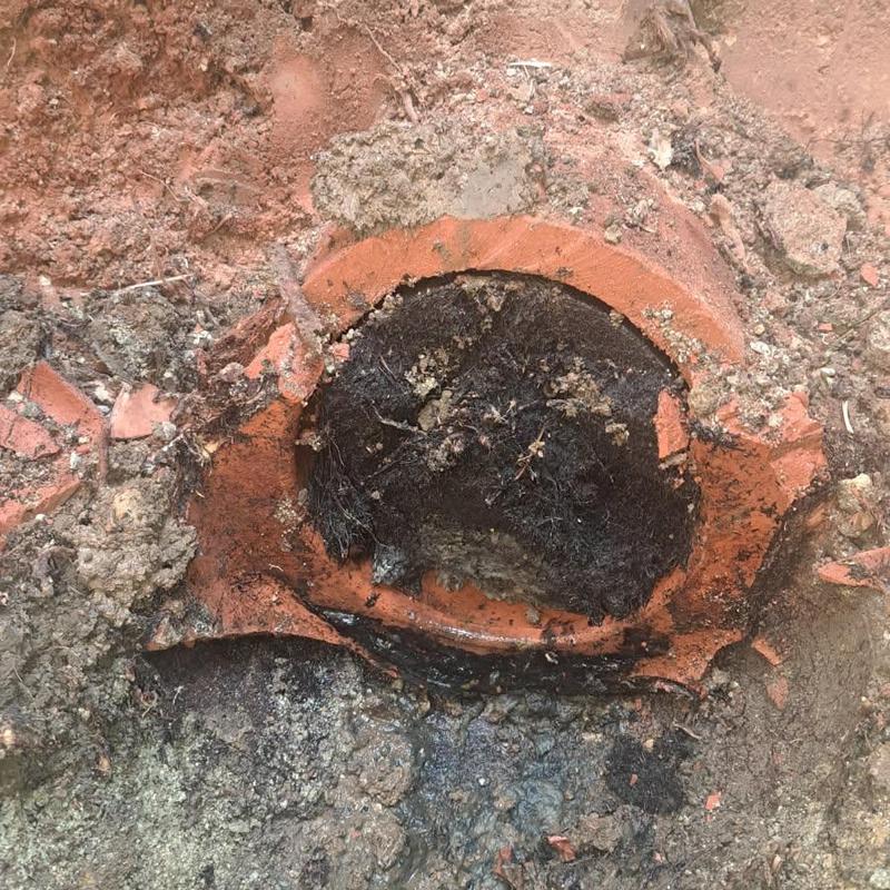 Clay sewer pipe section removed for permaliner prep