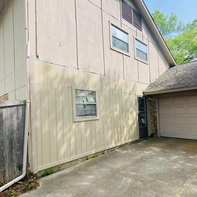 LP SmartSide siding and trim installation on house exterior