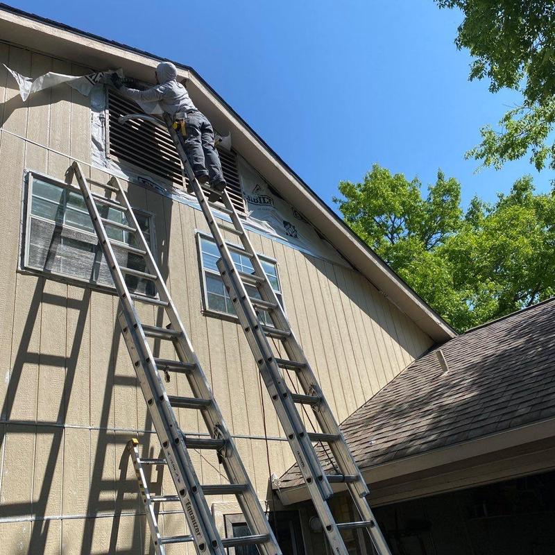 LP SmartSide siding and trim installation on house exterior