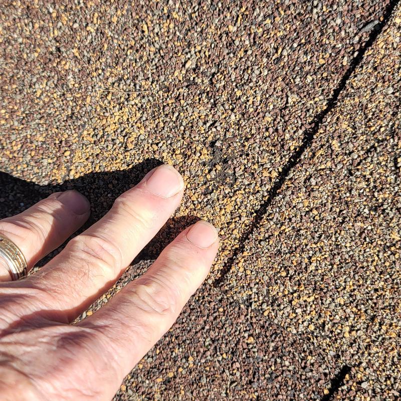 Asphalt shingle granule loss from hail storm damage