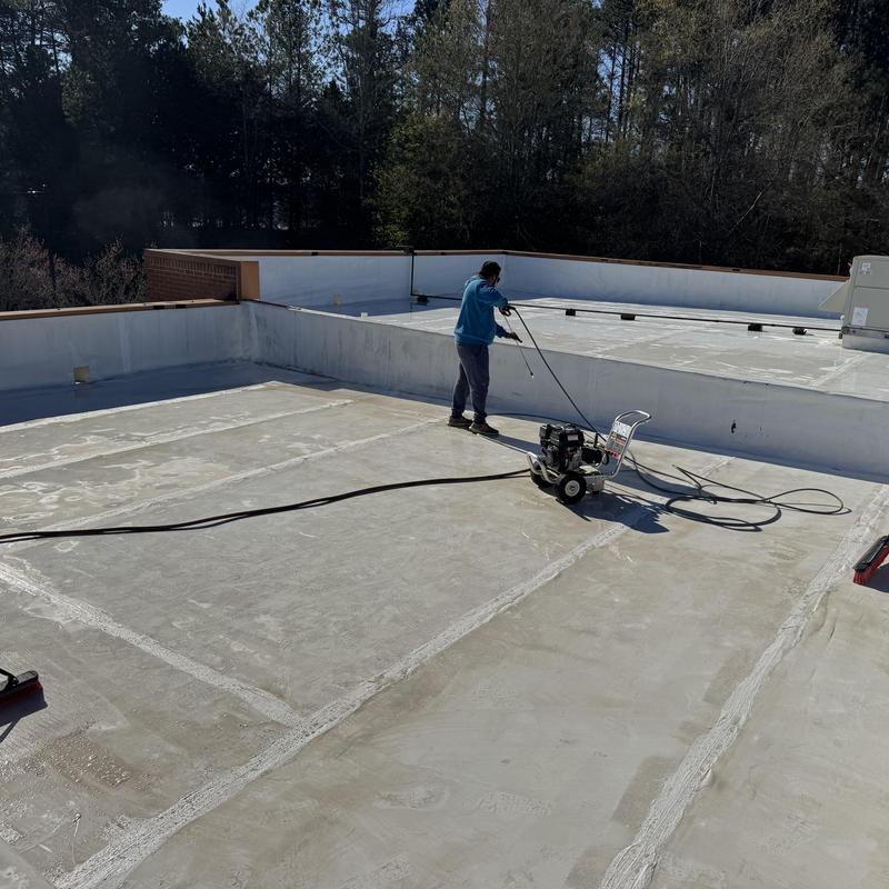 Flat roof silicone coating application in Kennesaw, GA
