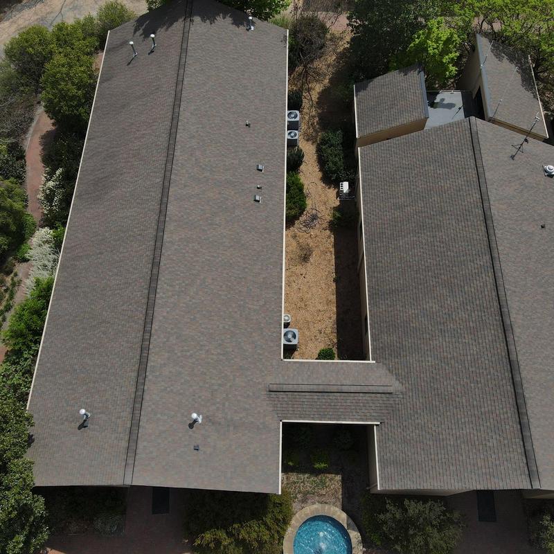 Commercial asphalt shingle roof on laboratory buildings Commercial asphalt shingle roof on laboratory buildings