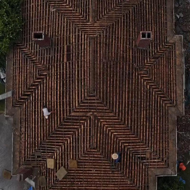 Roof decking removal and preparation with workers on site Roof decking removal and preparation with workers on site