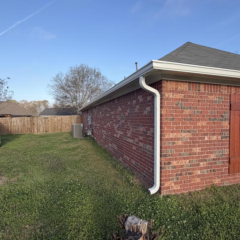 6-inch seamless gutter on brick house corner