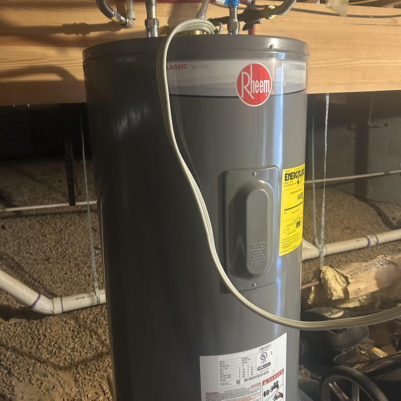 Electric water heater installation in crawl space