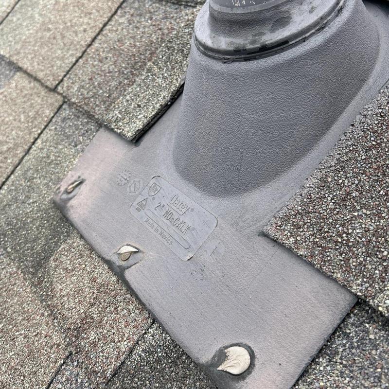 Pipe jack flashing on asphalt shingle roof