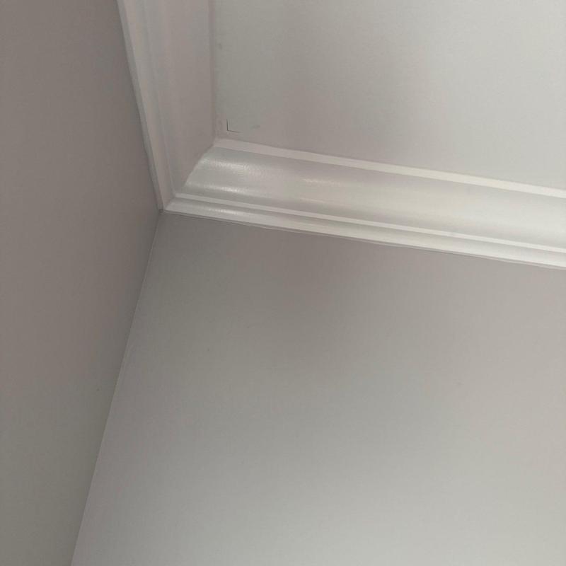 Ceiling crown molding and wall corner trim detail