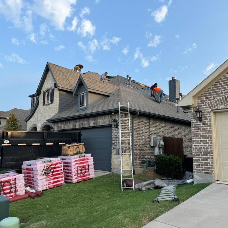 Asphalt shingle roof replacement after hail storm