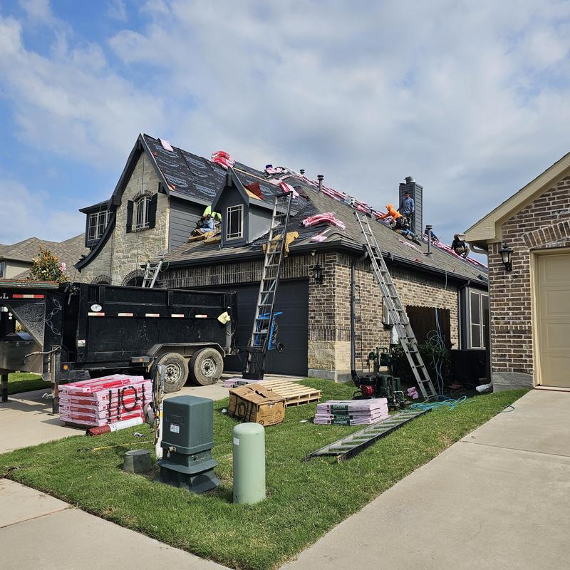 Roof shingles installation with ladders and materials