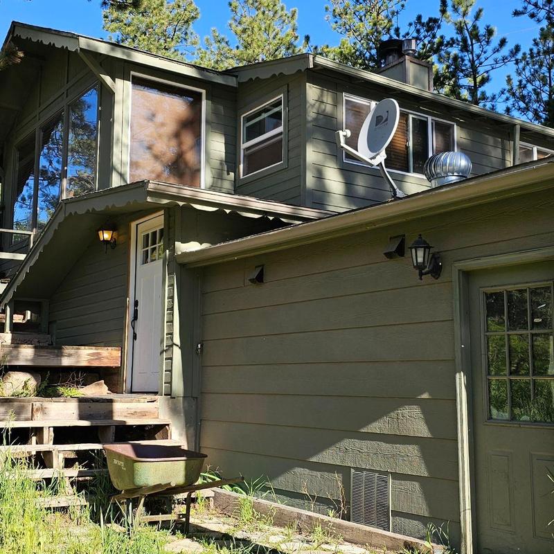 Satellite dish and exterior siding on two-story house Satellite dish and exterior siding on two-story house